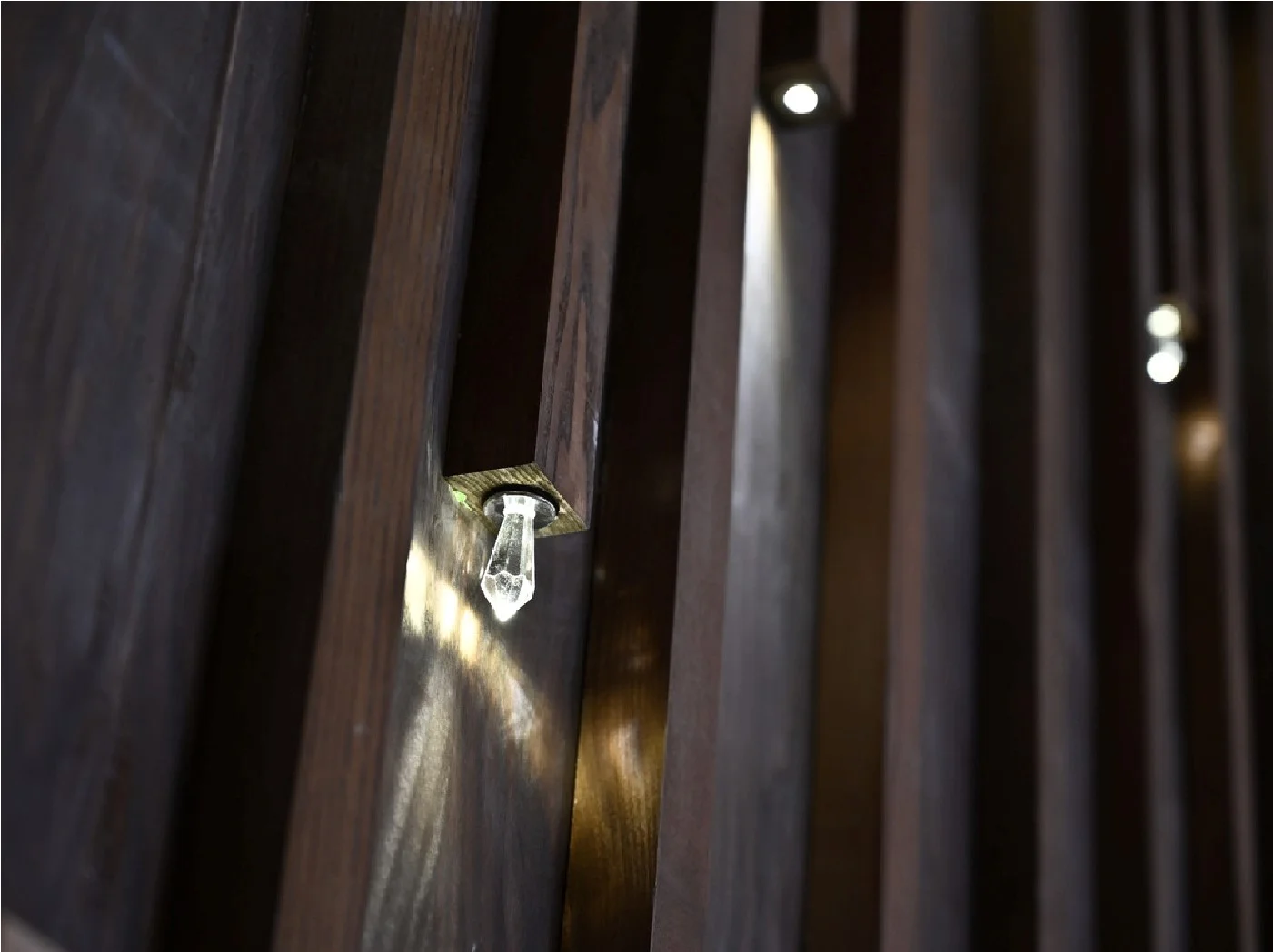 Strategic mirror placement amplifying scale and light