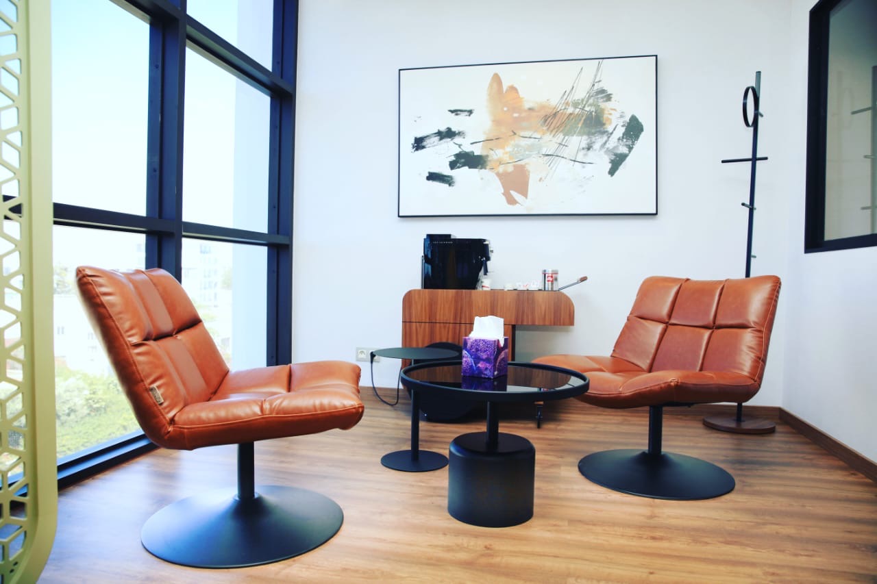 Playful arched patterns and backlit curves in the practice room